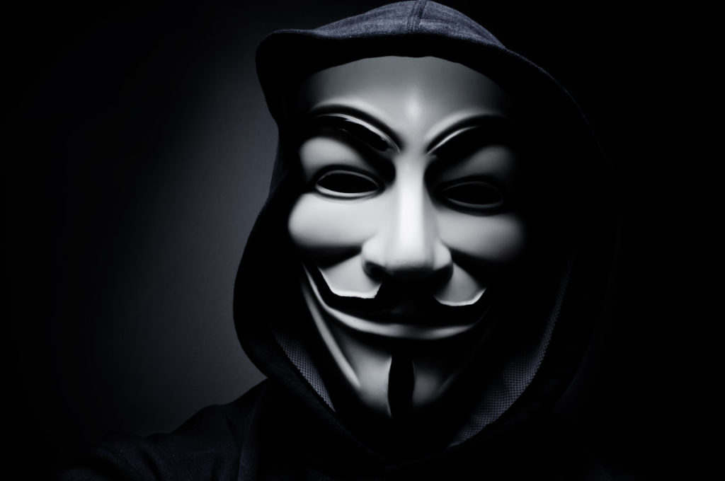 stock-photo-paris-france-january-man-wearing-vendetta-mask-this-mask-is-a-well-known-symbol-for-244924321-1